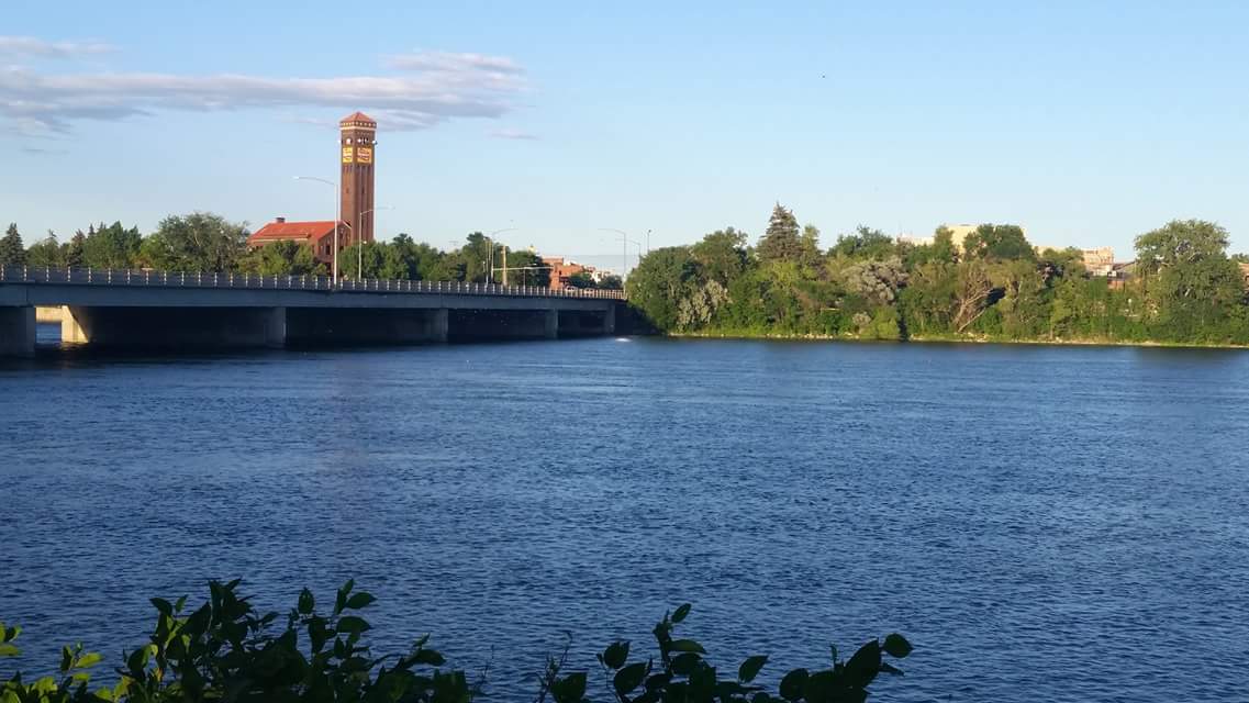 The Missouri River passing through Great Falls, Montana, with the historic Black Eagle tower